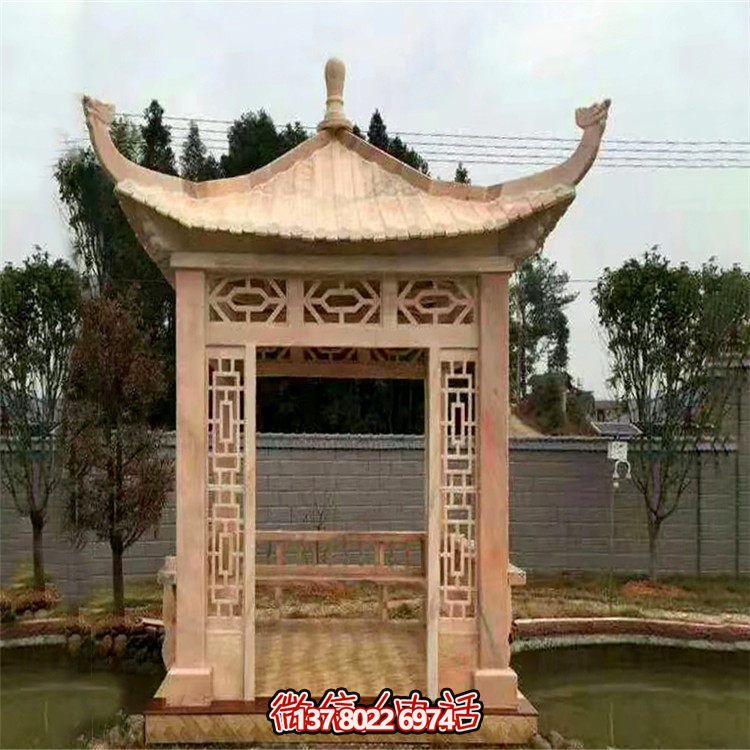 紅石雕鏤涼亭，晚霞中空中創意雕塑